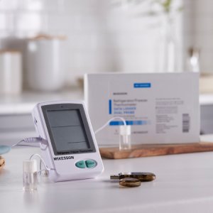 Datalogging Refrigerator / Freezer Thermometer with Alarm McKesson Fahrenheit / Celsius -58   to +158  F (-50   to +70  C) 2 Glycol Bottle Probes / Internal Sensor Flip-out Stand Battery Operated