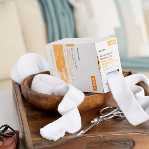 Elastic Net Retainer Dressing McKesson Tubular Elastic 18-1/2 Inch X 25 Yard (47 cm X 22.9 m) Size 6 White Small Head / Medium Shoulder / Thigh NonSterile