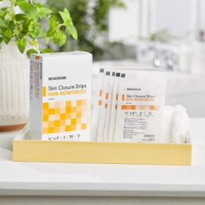 Skin Closure Strip McKesson 1/4 X 3 Inch Nonwoven Material Flexible Strip Tan